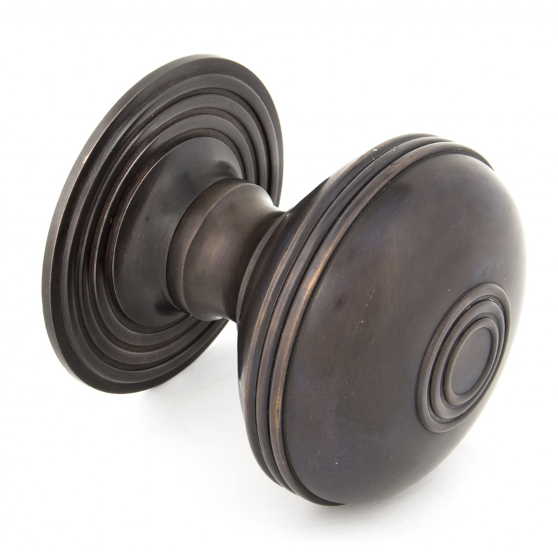 aged bronze door knobs photo - 10