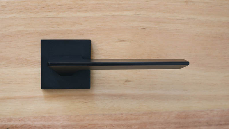 black door knobs and hinges photo - 10