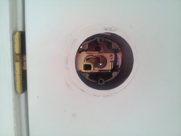 door knob lock stuck photo - 1