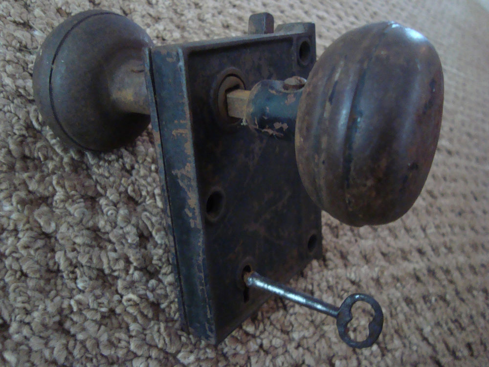 door knob with lock and key photo - 18