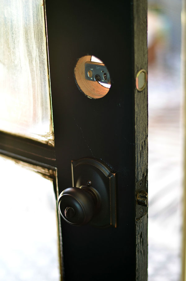 taking off a door knob photo - 1