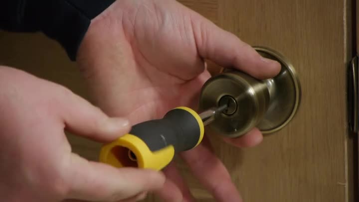 unlocking door knob with hole photo - 12