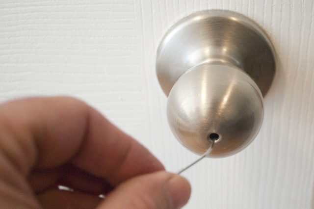 unlocking door knob with hole photo - 4