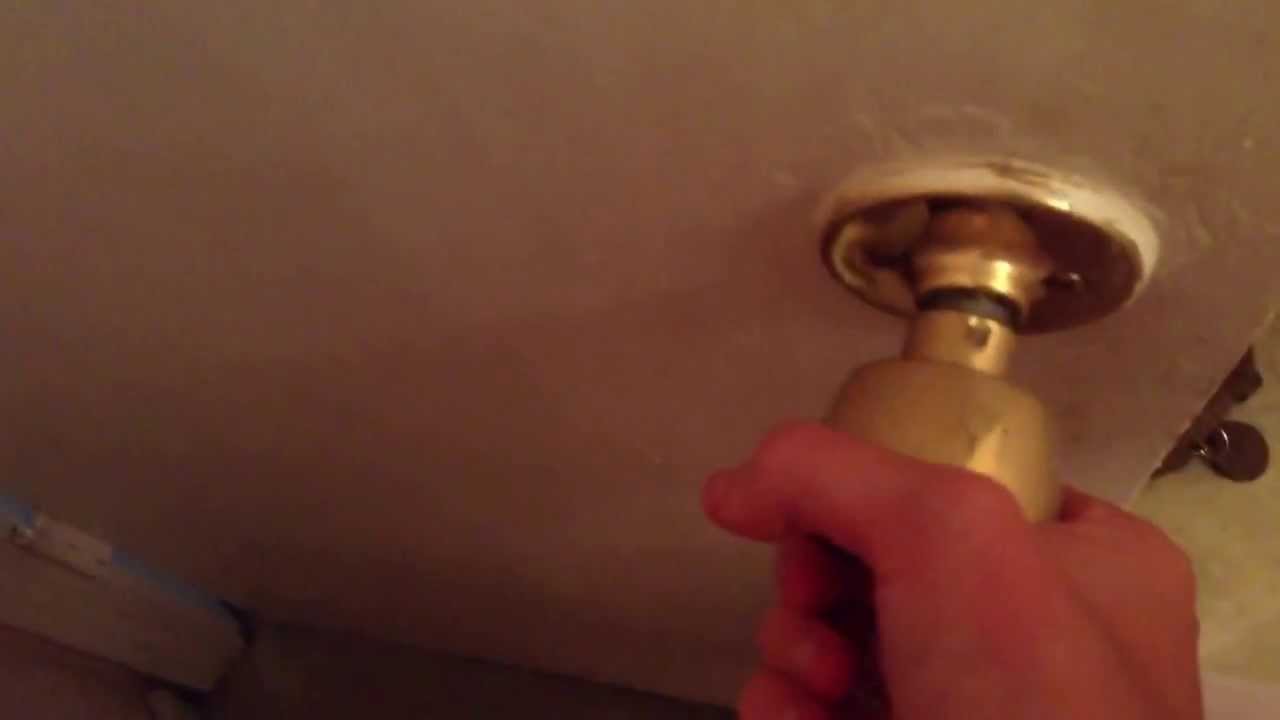 unlocking door knob with hole photo - 7