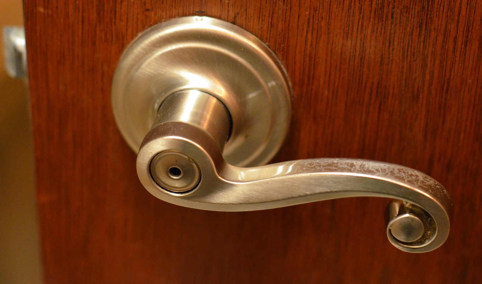 unlocking door knob with hole photo - 8