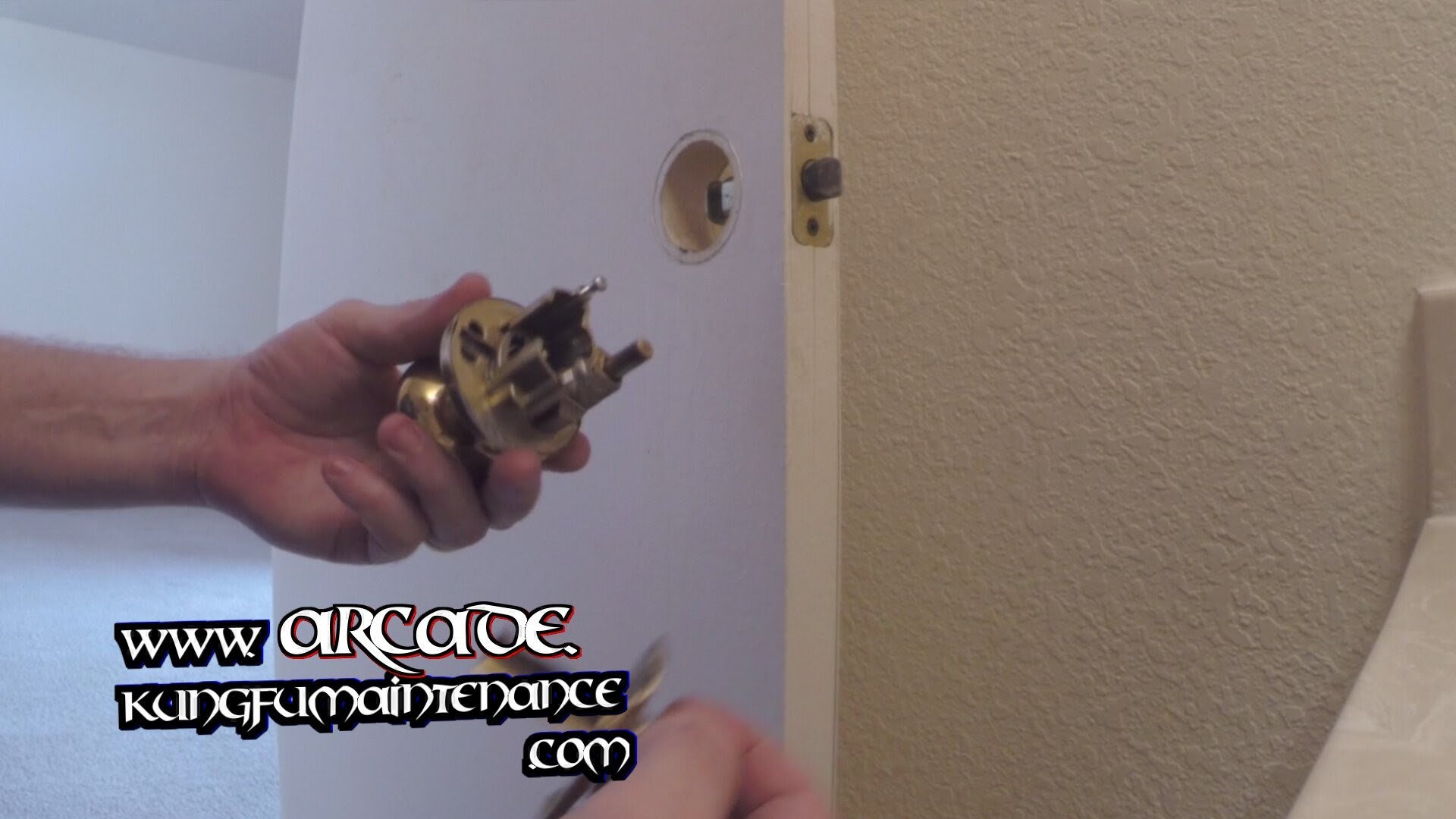 weslock door knob removal photo - 19